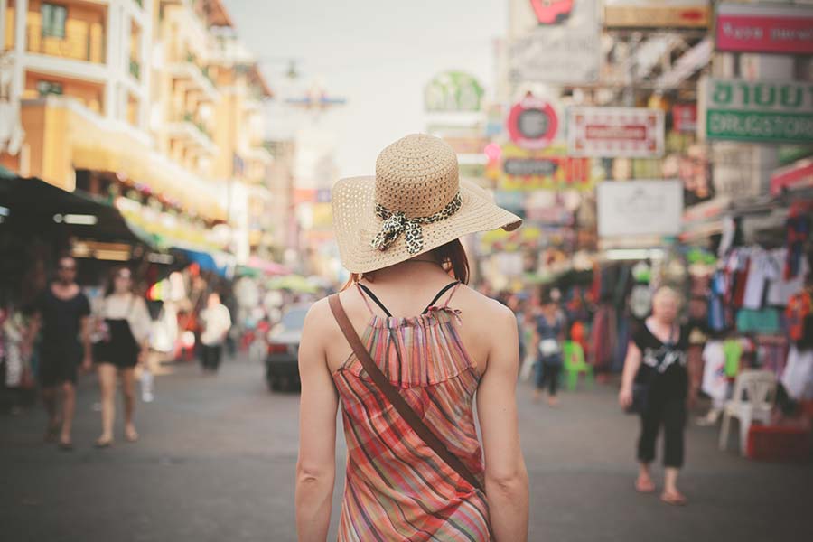 woman walking down khao san Road