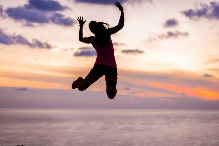 woman jumping in the air