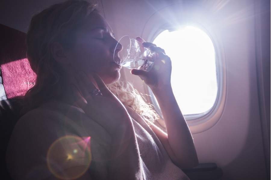 Drinking water on the plane