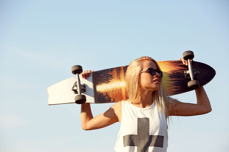 Extreme sports in Colorado - skate boarding woman